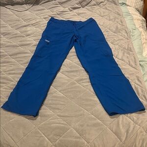 Blue scrubs pants, set available. Cherokee small.